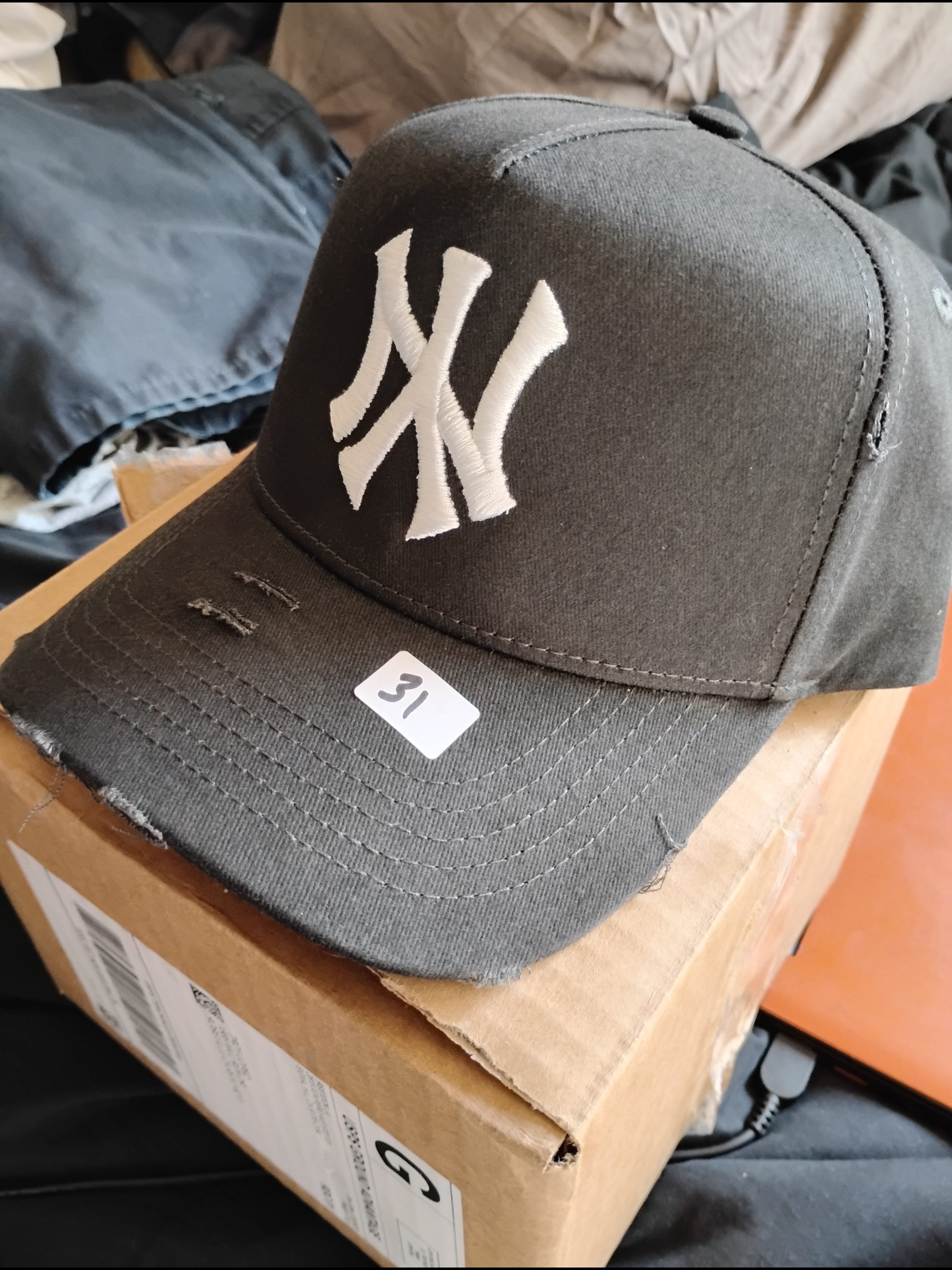 Black Baseball Cap With White Embroidered Logo